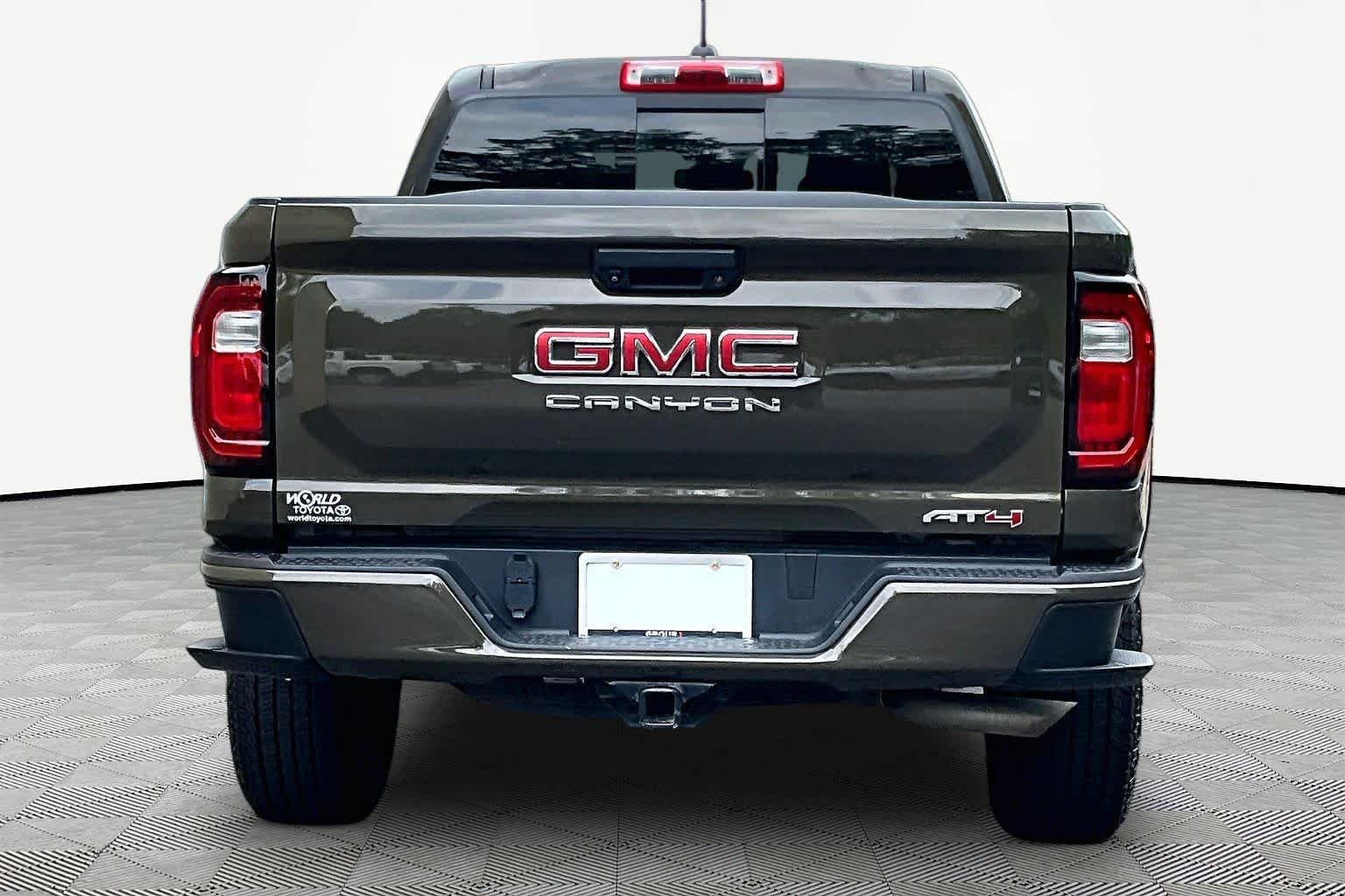 Used 2023 Deep Bronze Metallic GMC 4WD AT4 image 5