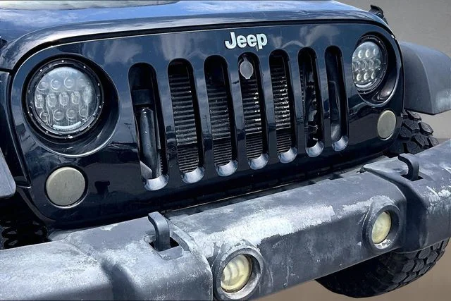 Used 2013 Black Jeep Unlimited Sport image 21