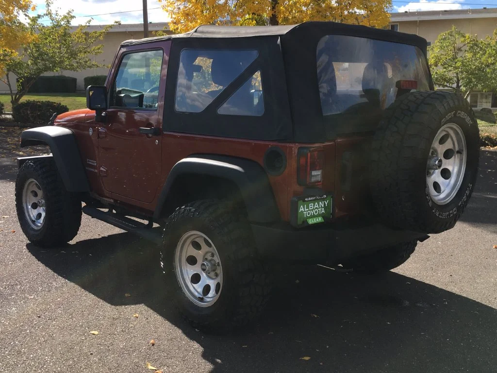 Used 2014 Orange Jeep Sport image 4