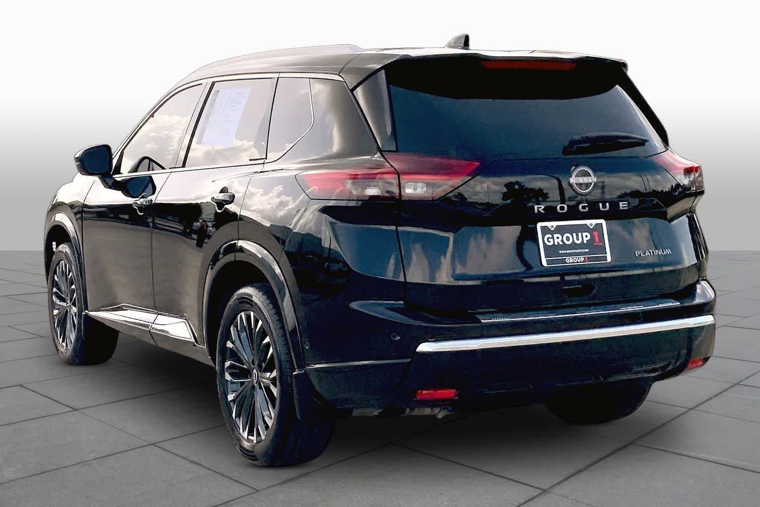 Used 2024 Super Black Nissan Platinum image 12