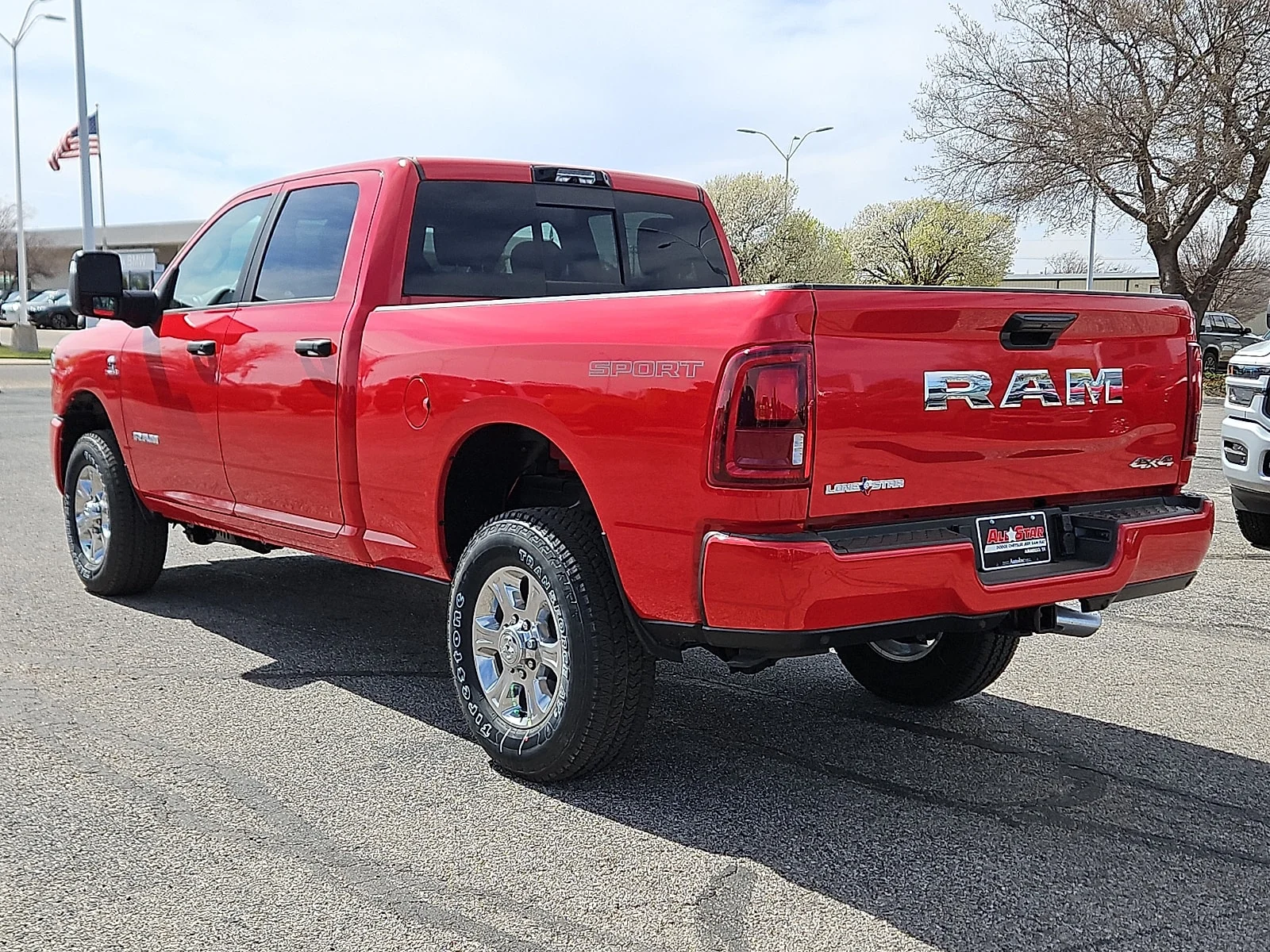 New 2026 Flame Red Ram LONE STAR CREW CAB 4X4 6