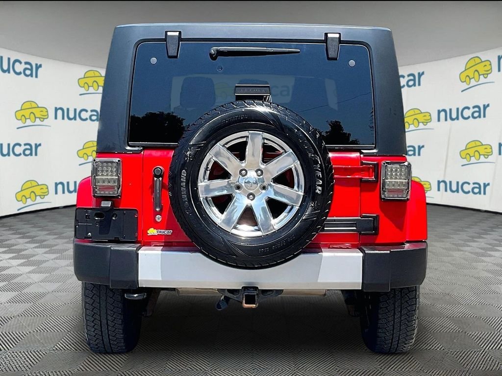 Used 2015 Red Jeep Unlimited Sahara image 5