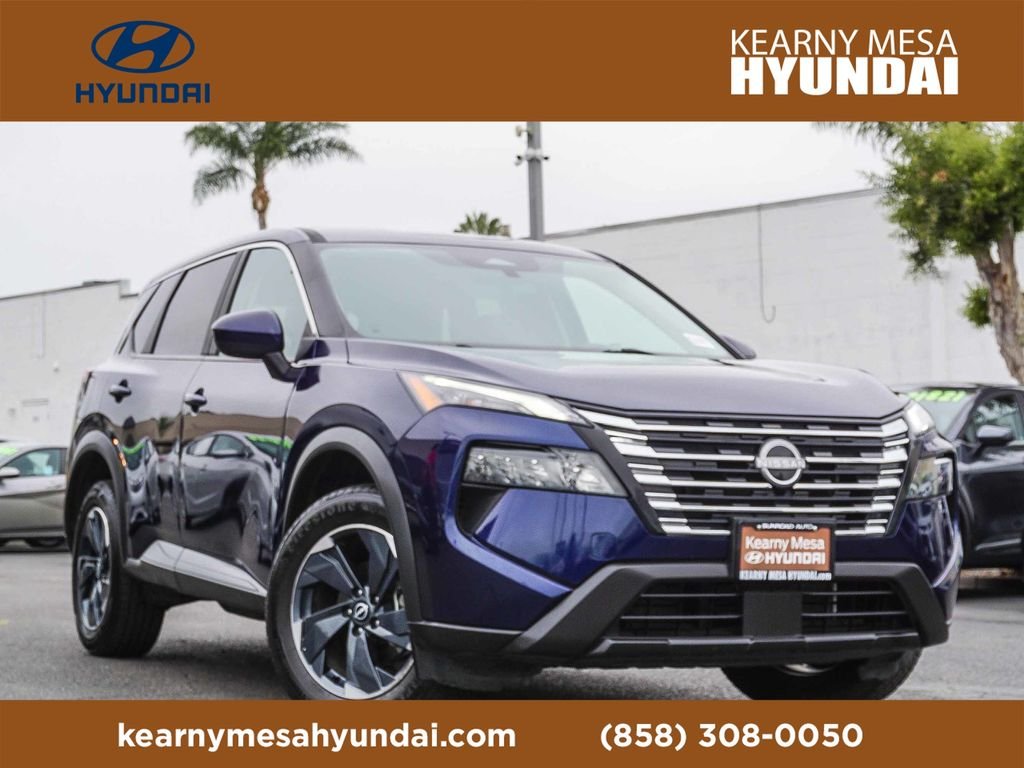 Used 2024 Blue Nissan SV image 1