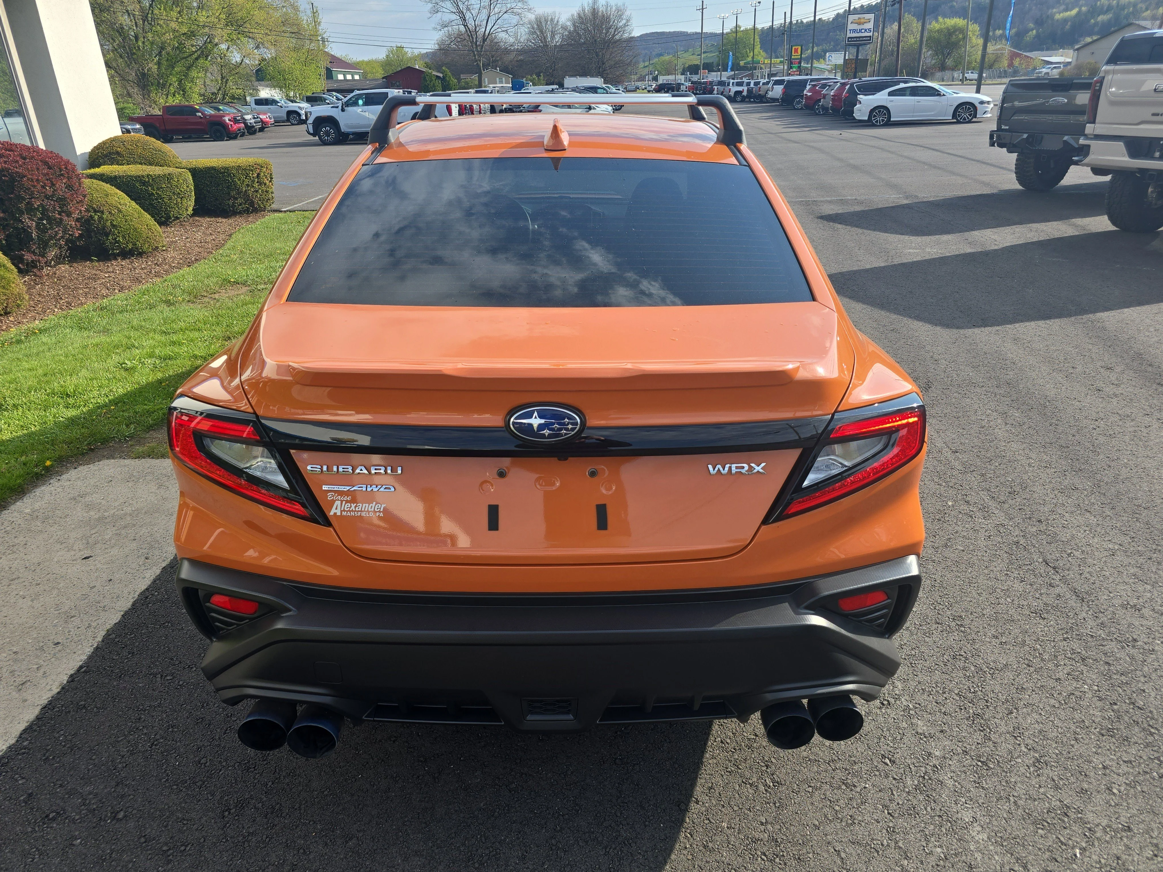 Used 2023 Solar Orange Pearl Subaru Premium image 4