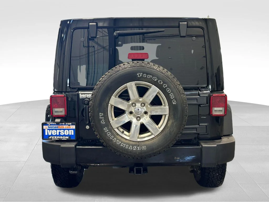 Used 2016 Black Jeep Unlimited Sahara image 6