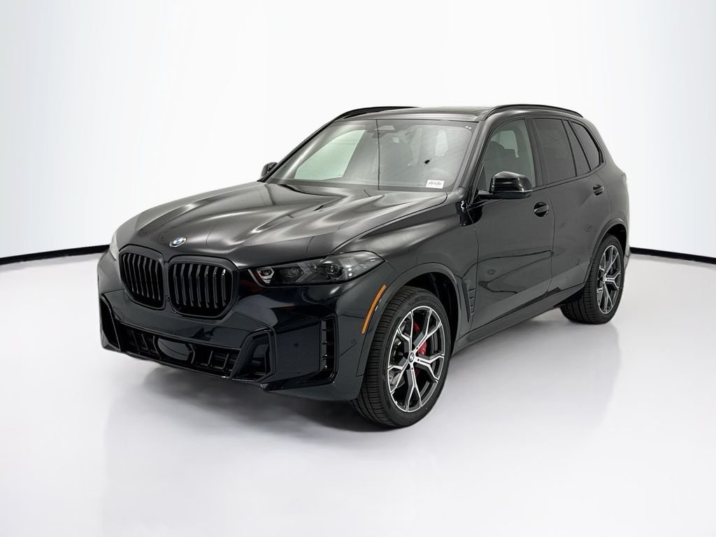 Used 2026 Black Sapphire Metallic BMW xDrive40i image 1