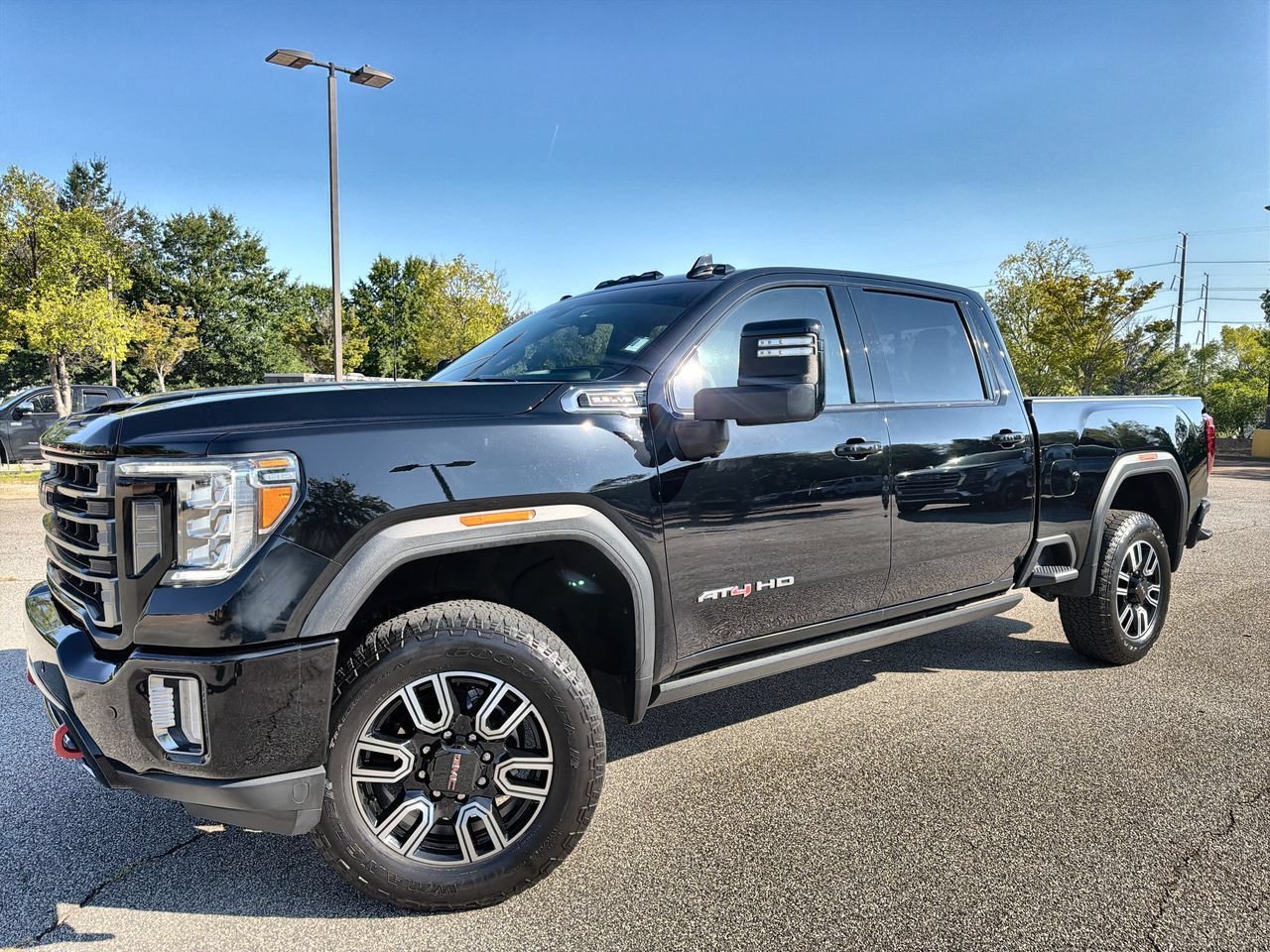 Used 2022 ONYX BLACK GMC AT4 image 1