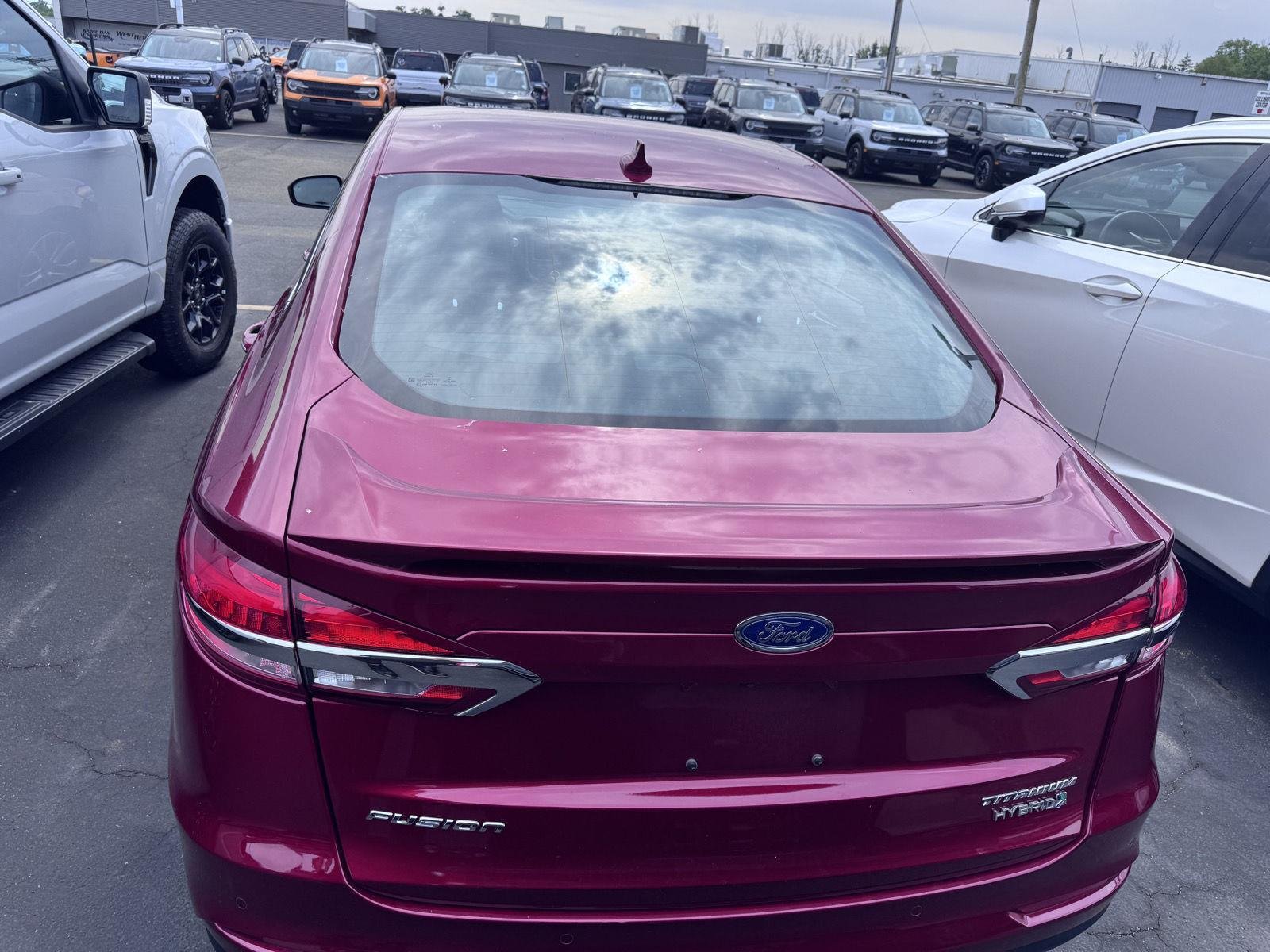 Used 2019 Ruby Red Metallic Tinted Clearcoat Ford Titanium image 5