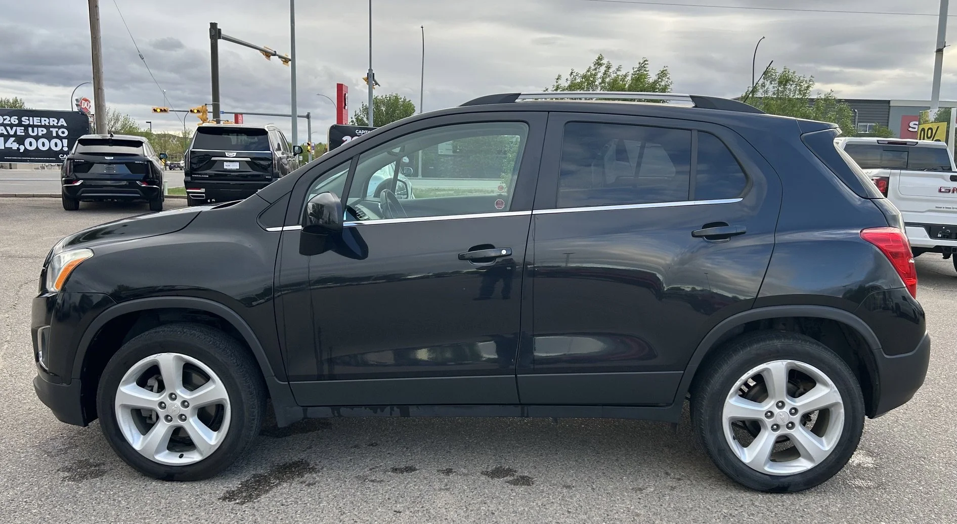 Used 2015 Black Chevrolet LTZ AWD image 2