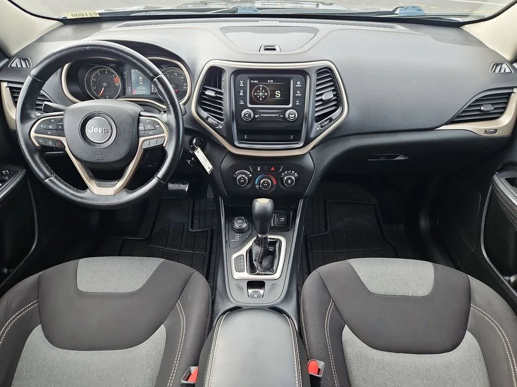 Used 2016 Granite Crystal Metallic Clearcoat Jeep Sport image 22