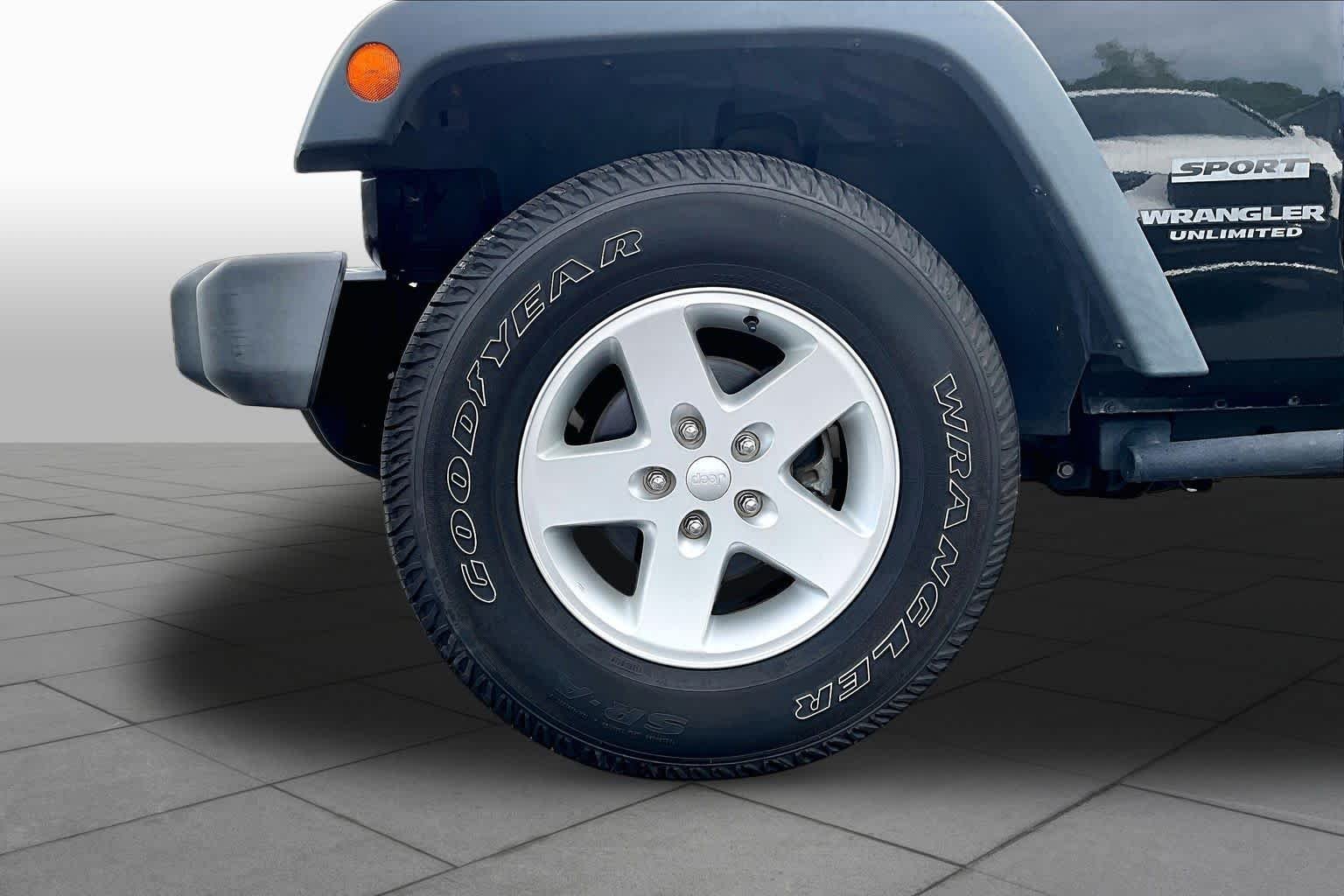 Used 2016 Black Clearcoat Jeep Sport image 10