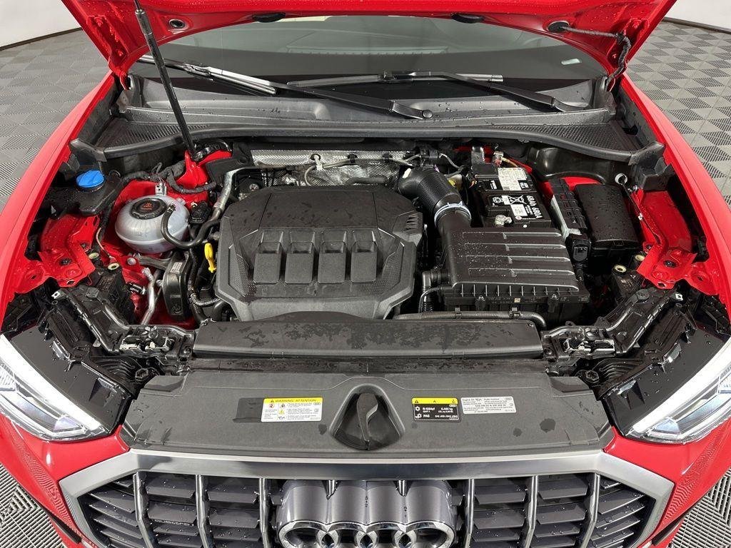 Used 2025 Progressive Red Metallic Audi Premium Plus image 3