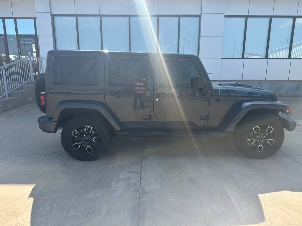 Used 2017 Black Jeep Unlimited Sahara image 22