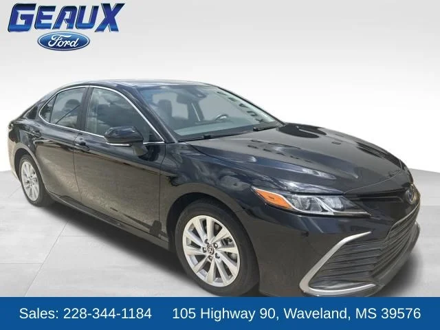 Certified Used 2024 Midnight Black Metallic Toyota LE image 1