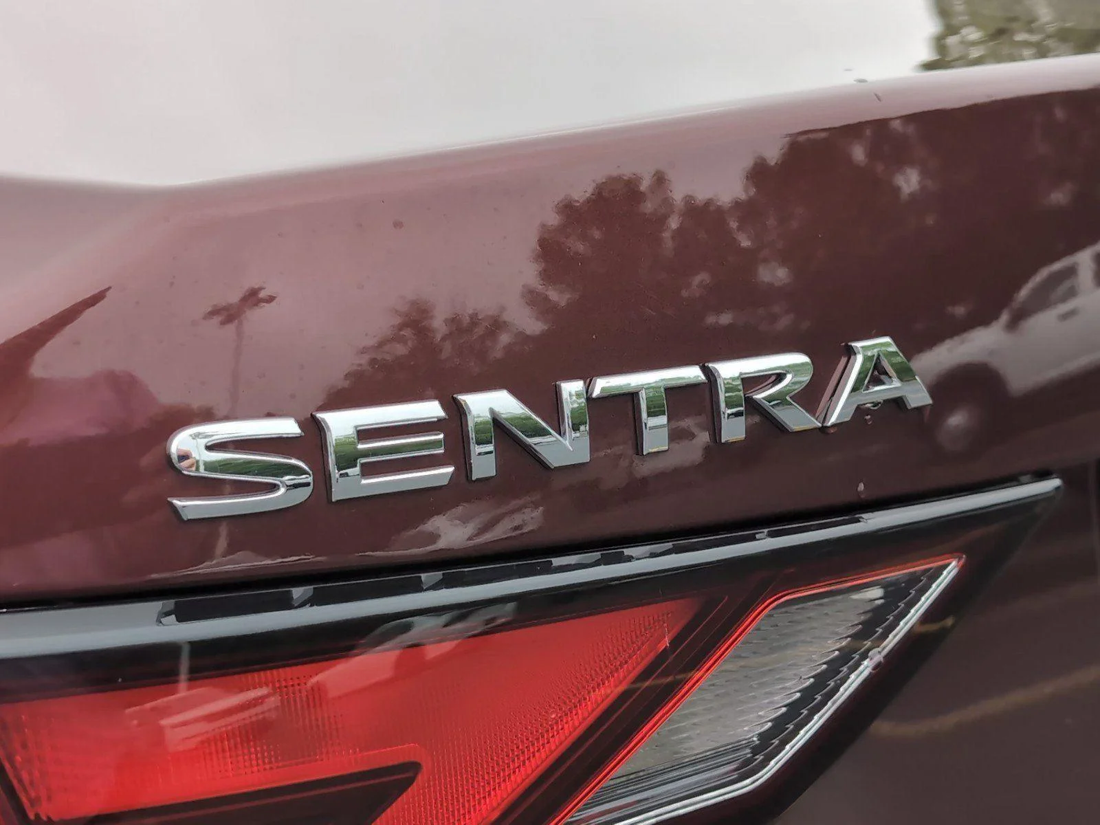 Used 2024 Rosewood Metallic Nissan SV image 5