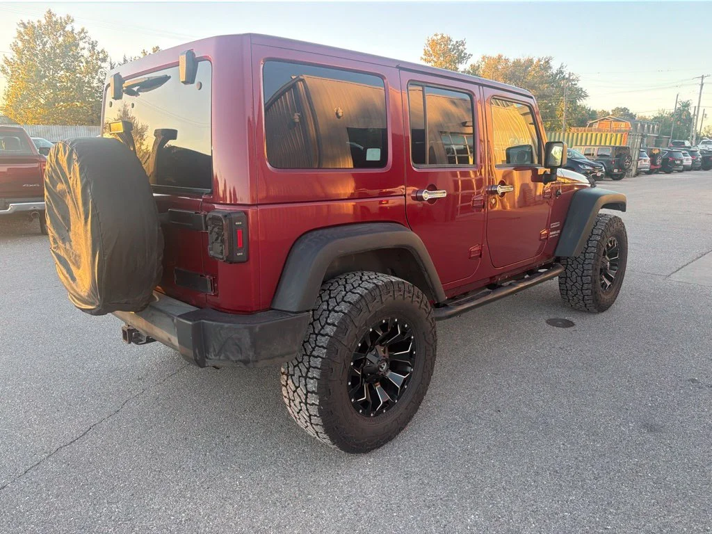 Used 2012 Red Jeep Unlimited Sport S image 5