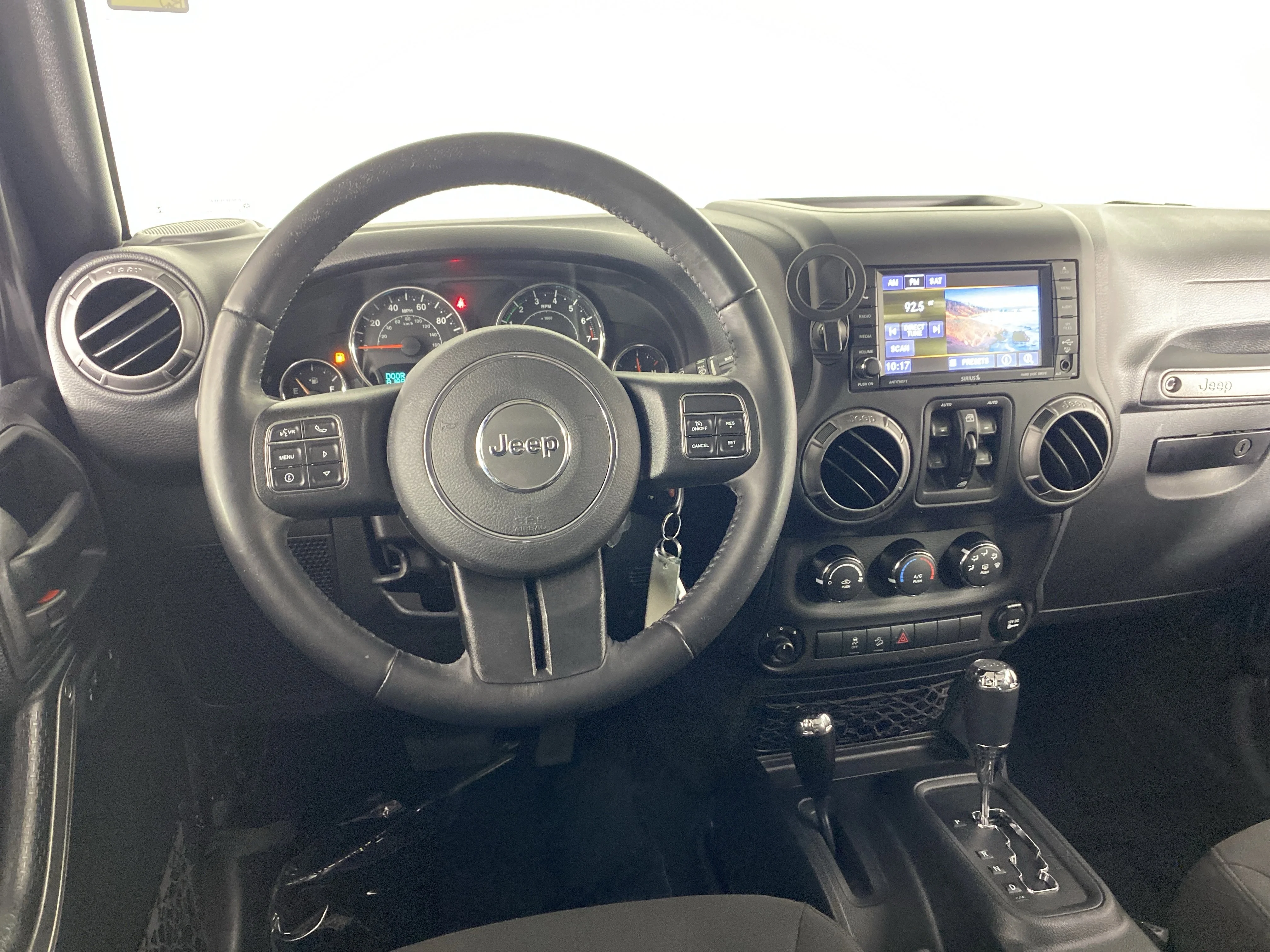 Used 2018 Granite Crystal Metallic Clearcoat Jeep Sport S image 16