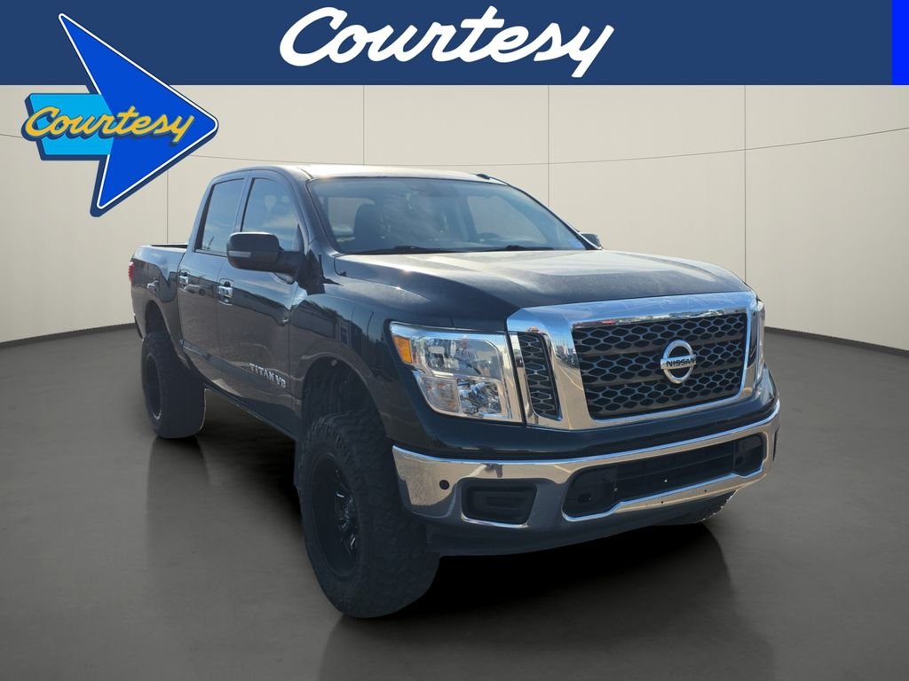 Used 2018 Black Nissan SV image 1