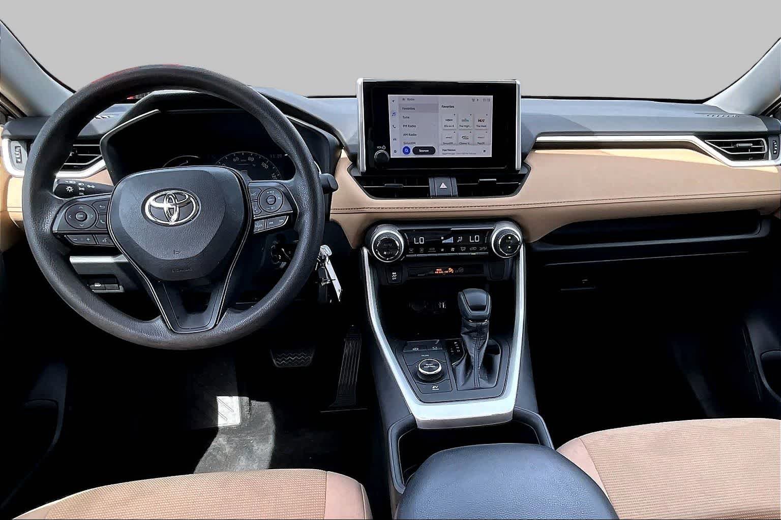 Used 2023 Midnight Black Metallic Toyota Hybrid LE image 11