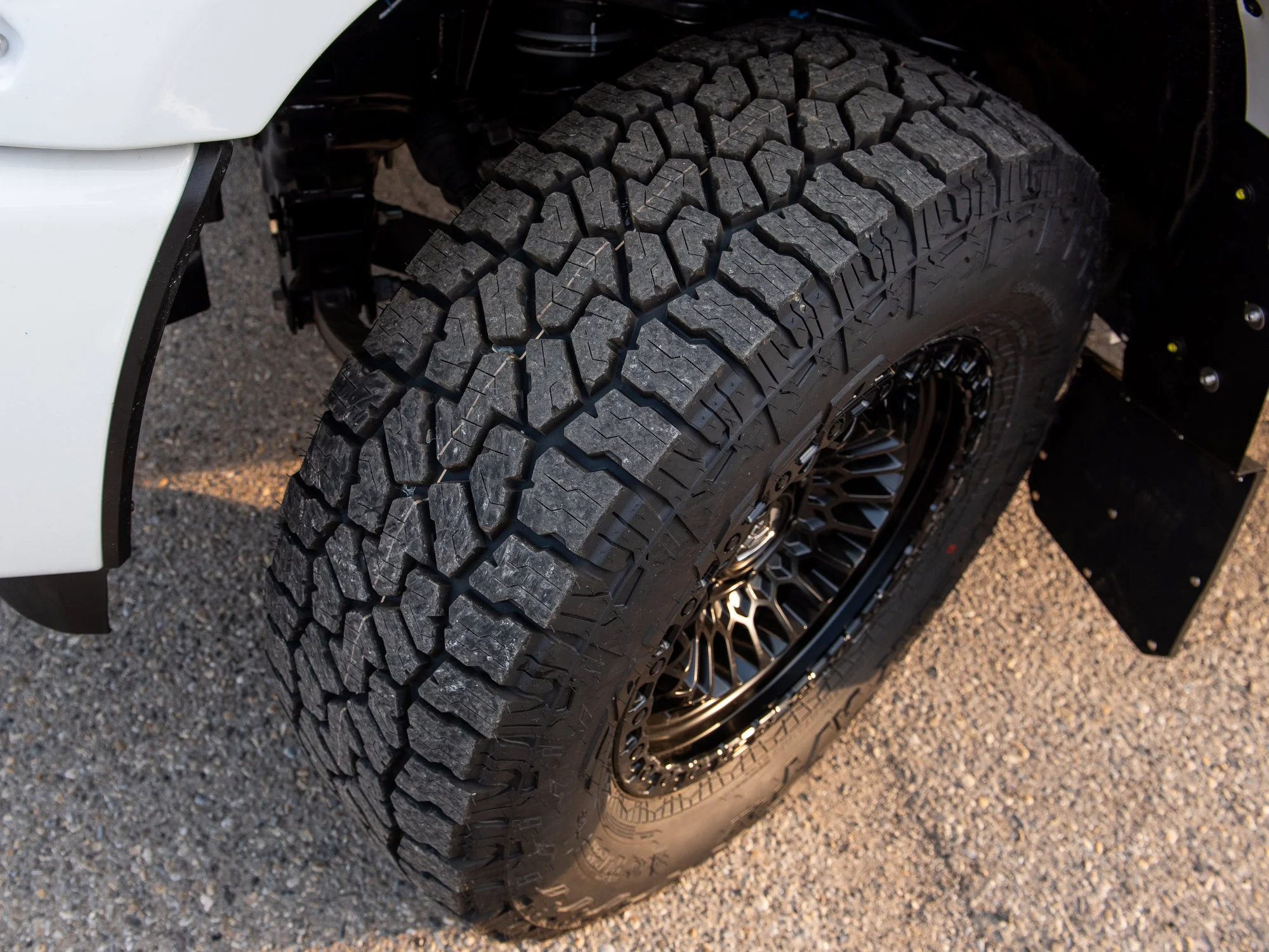 New 2026 White RAM Sport*, 6 Inch Lift, 37 Inch Tires, Trigger Industries Mudflaps image 2