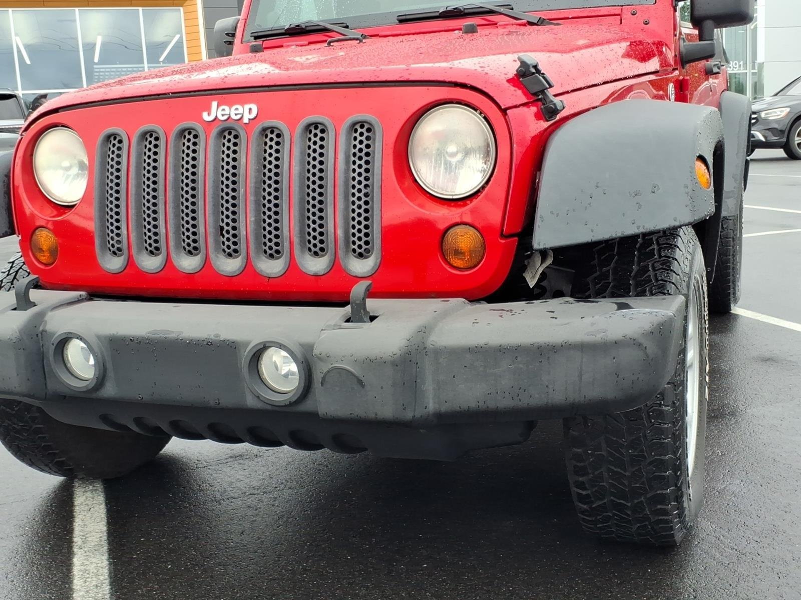 Used 2013 Flame Red Clearcoat Jeep Sport image 14