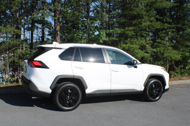 Used 2021 Super White Toyota LE image 2