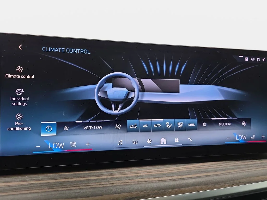Used 2025 Black Sapphire Metallic BMW xDrive50e image 22