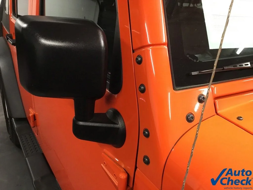 Used 2015 Orange Jeep Unlimited Sport image 21