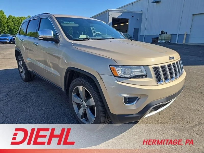 Used 2014 Beige Jeep Limited image 1