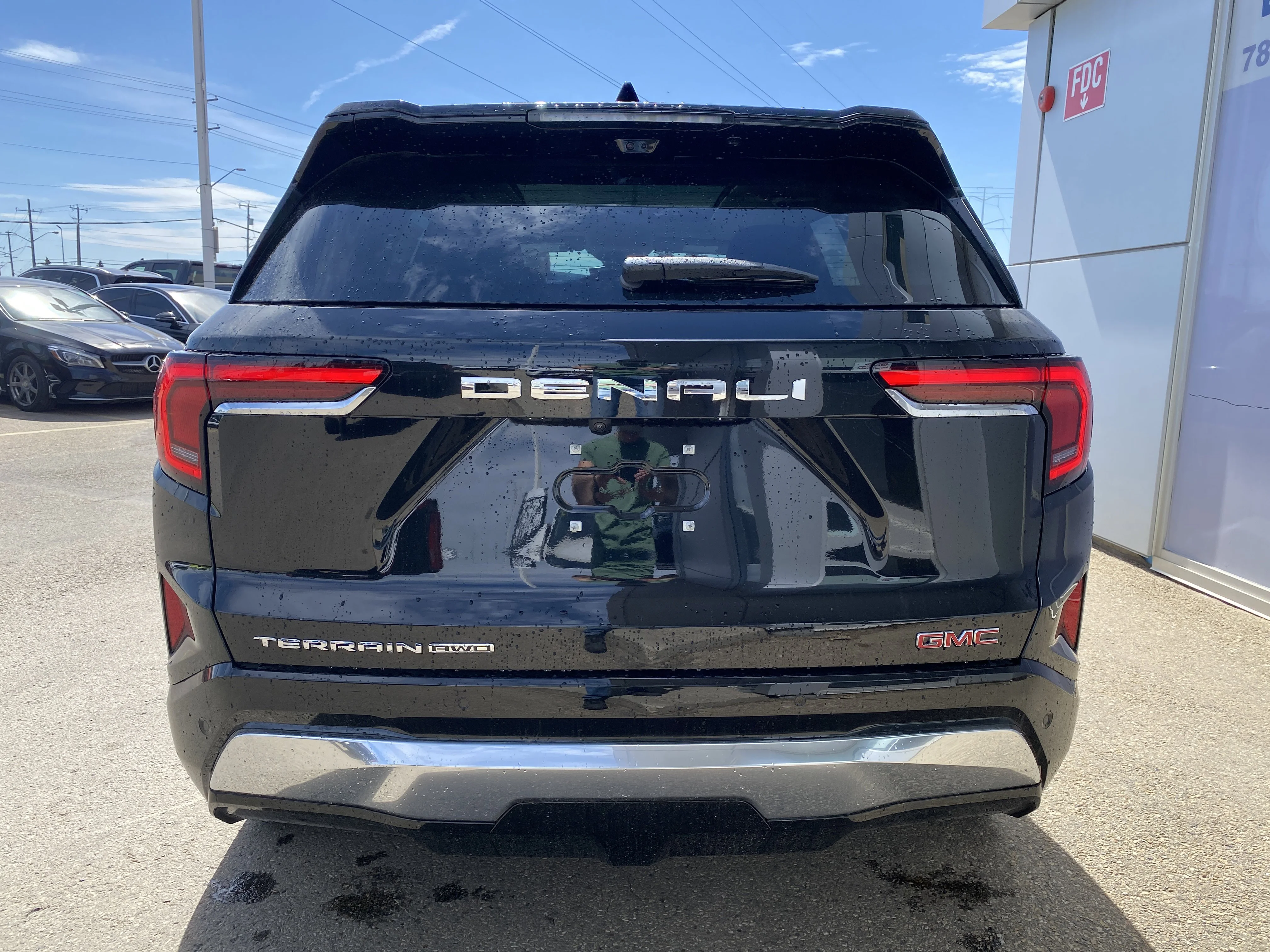 New 2026 EBONY TWILIGHT METALLIC GMC AWD Denali image 5