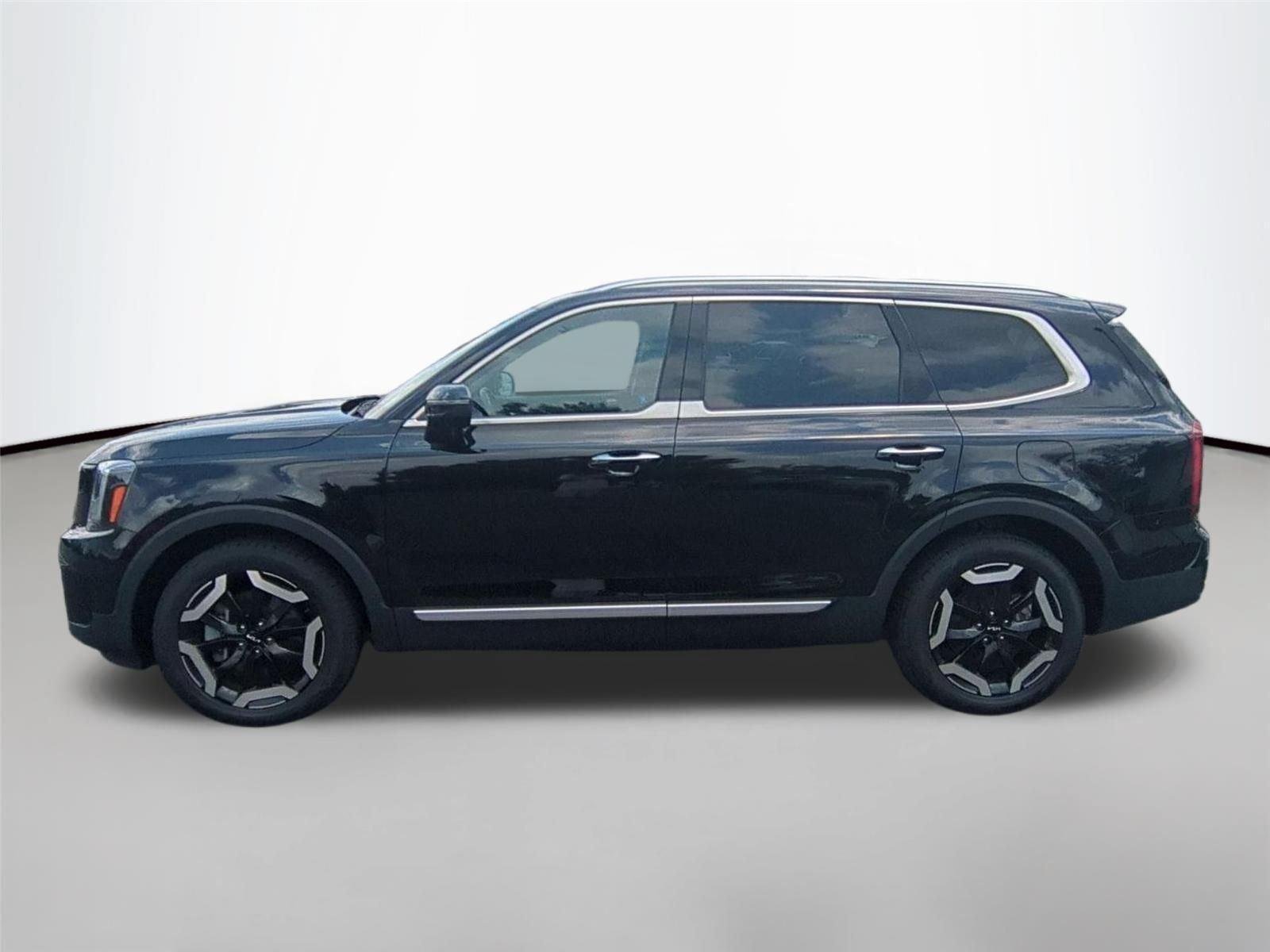 Used 2025 Ebony Black Kia S image 6