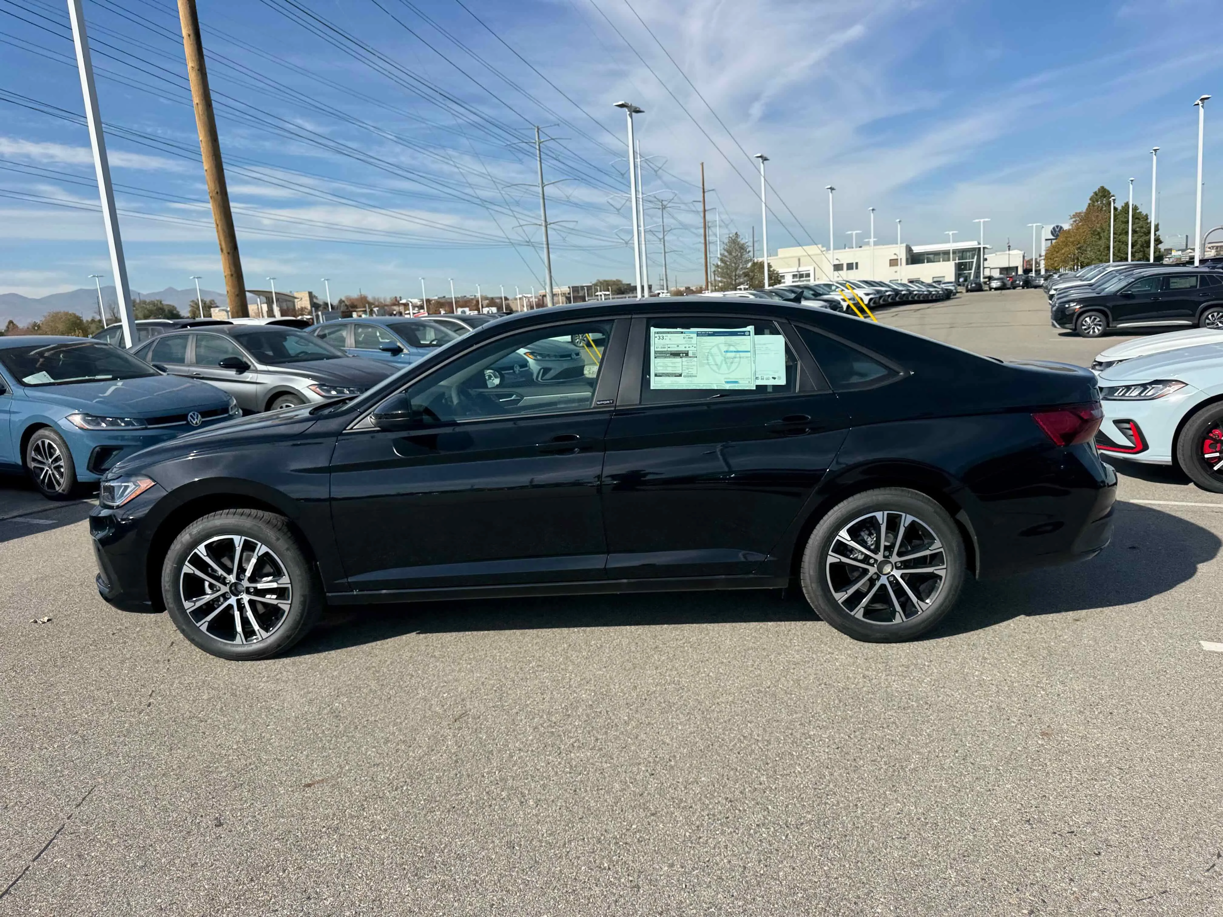 New 2026 Deep Black Volkswagen Sport image 2