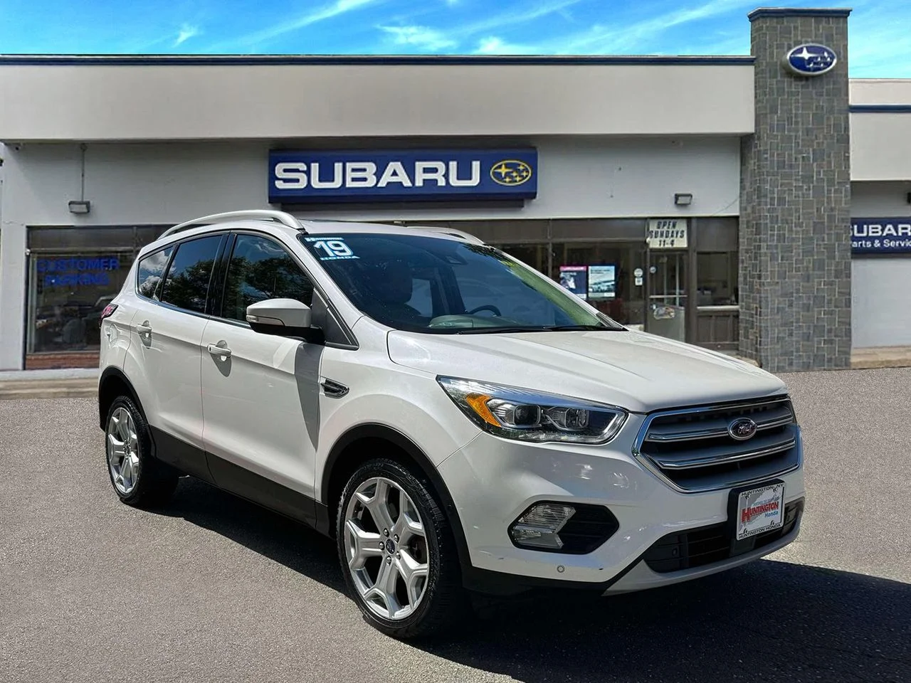 Used 2019 White Platinum Clearcoat Metallic Ford Titanium image 1