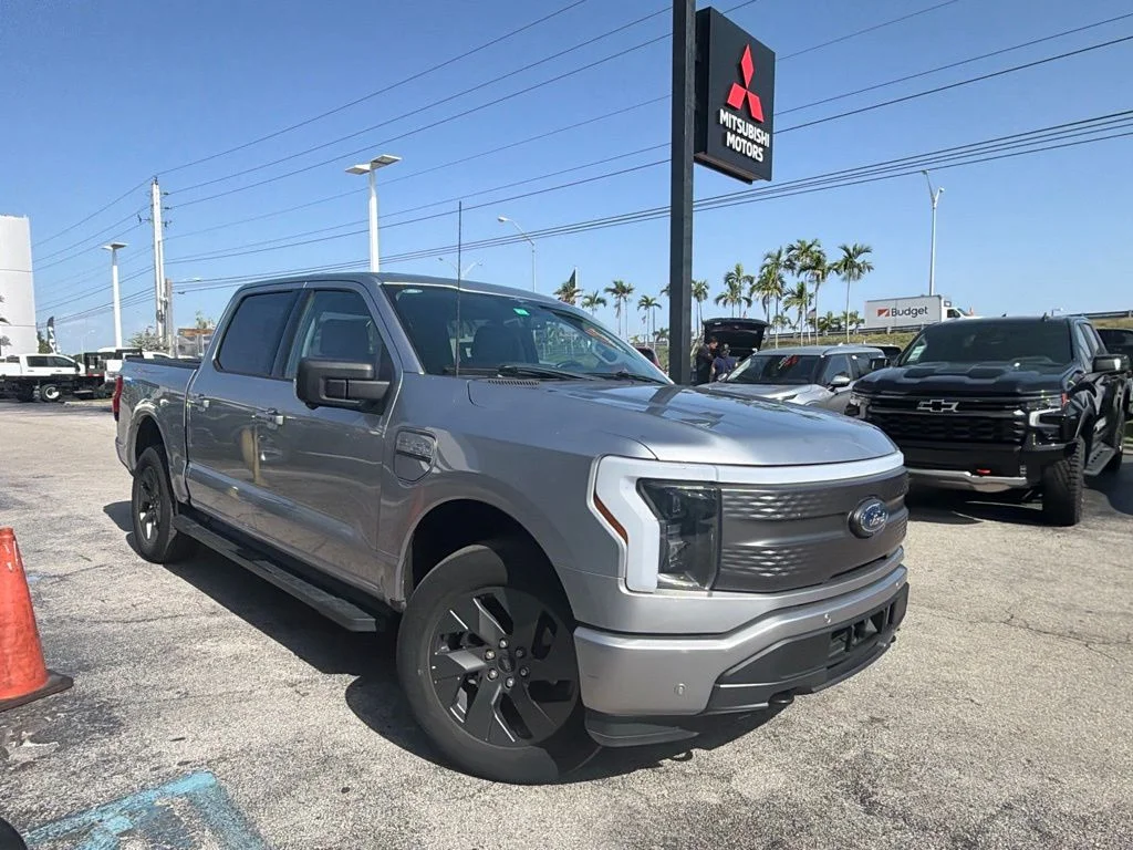 Used 2023 Ford F-150 Lightning XLT with VIN 1FT6W1EVXPWG54742 for sale in Miami Lakes, FL