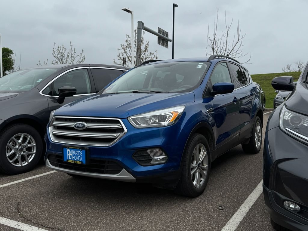 Used 2017 Ford Escape SE with VIN 1FMCU9G92HUE47844 for sale in Coon Rapids, Minnesota