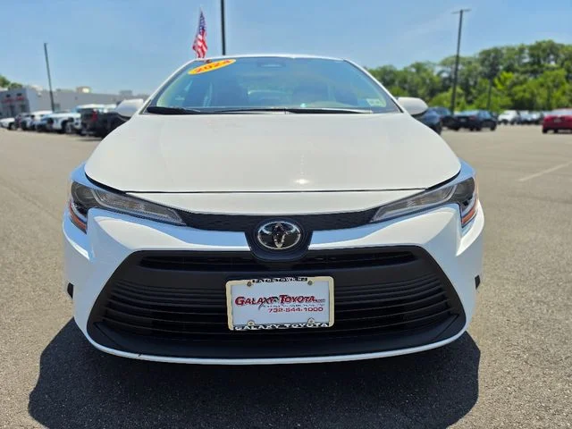 Used 2024 White Toyota LE image 2