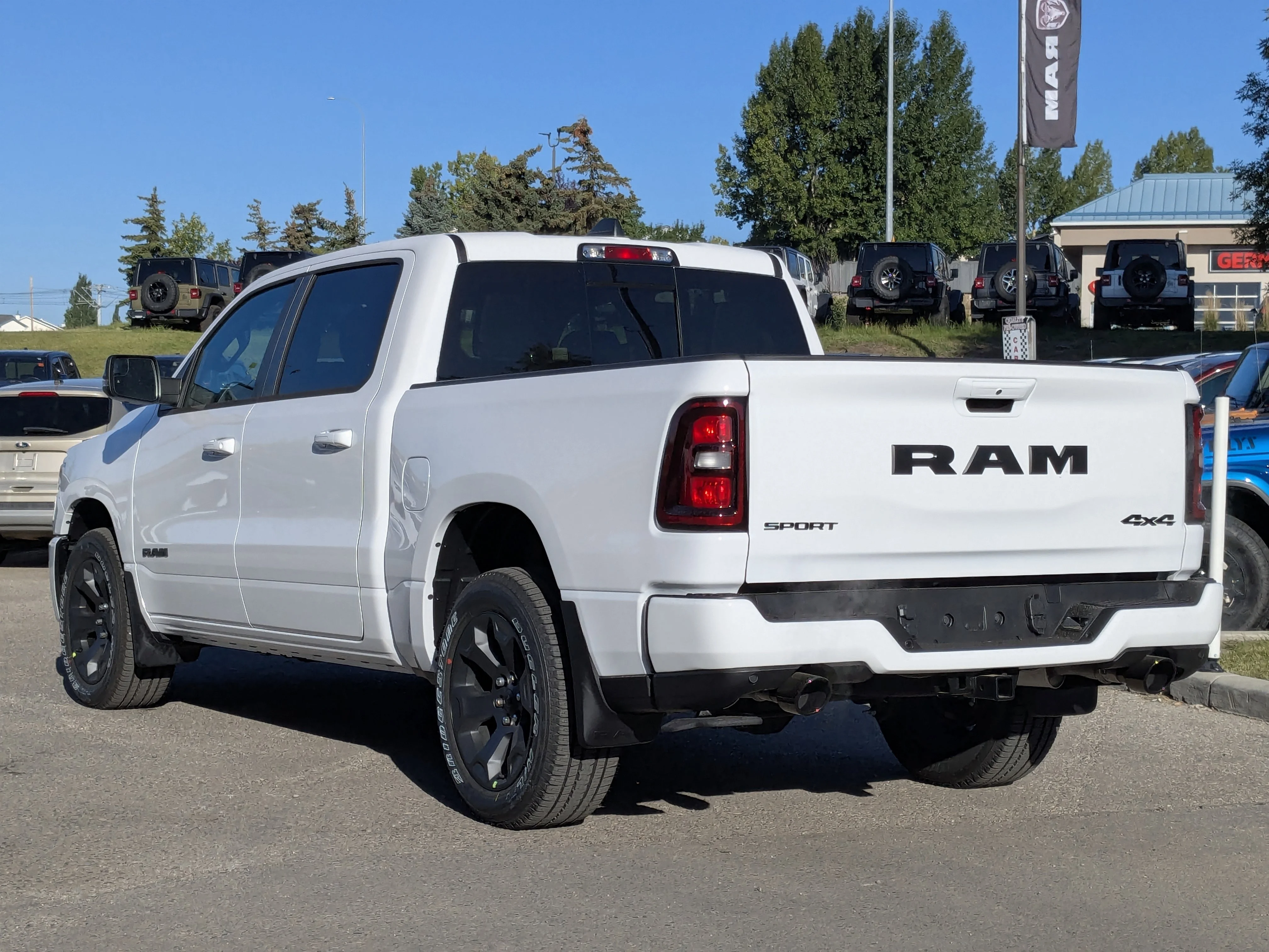New 2026 White RAM Sport - 3.92 Rear Axle Ratio - Anti Spin Rear Diff - Sport Hood - Panoramic Sunroof & Tons More! image 5