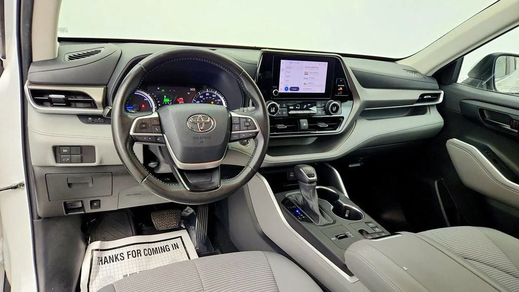 Used 2023 Wind Chill Pearl Toyota Hybrid LE AWD w/ 3-Row Seating & Toyota Safety Sense image 12
