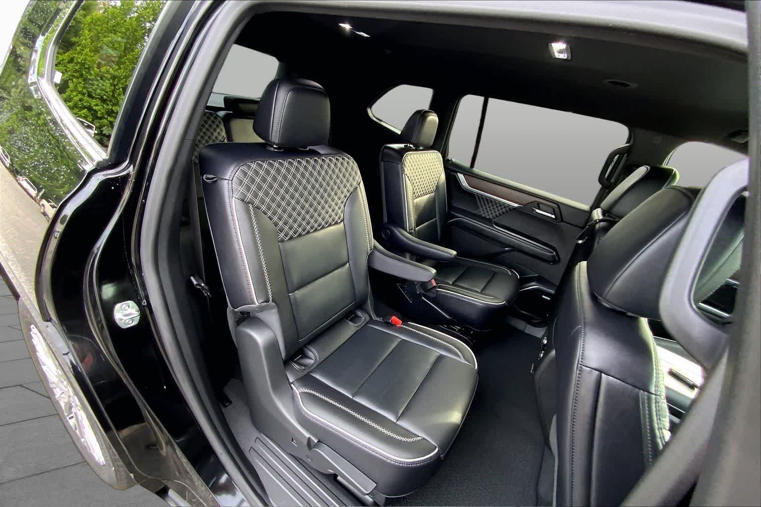 Used 2025 Ebony Twilight Metallic GMC FWD Denali image 19