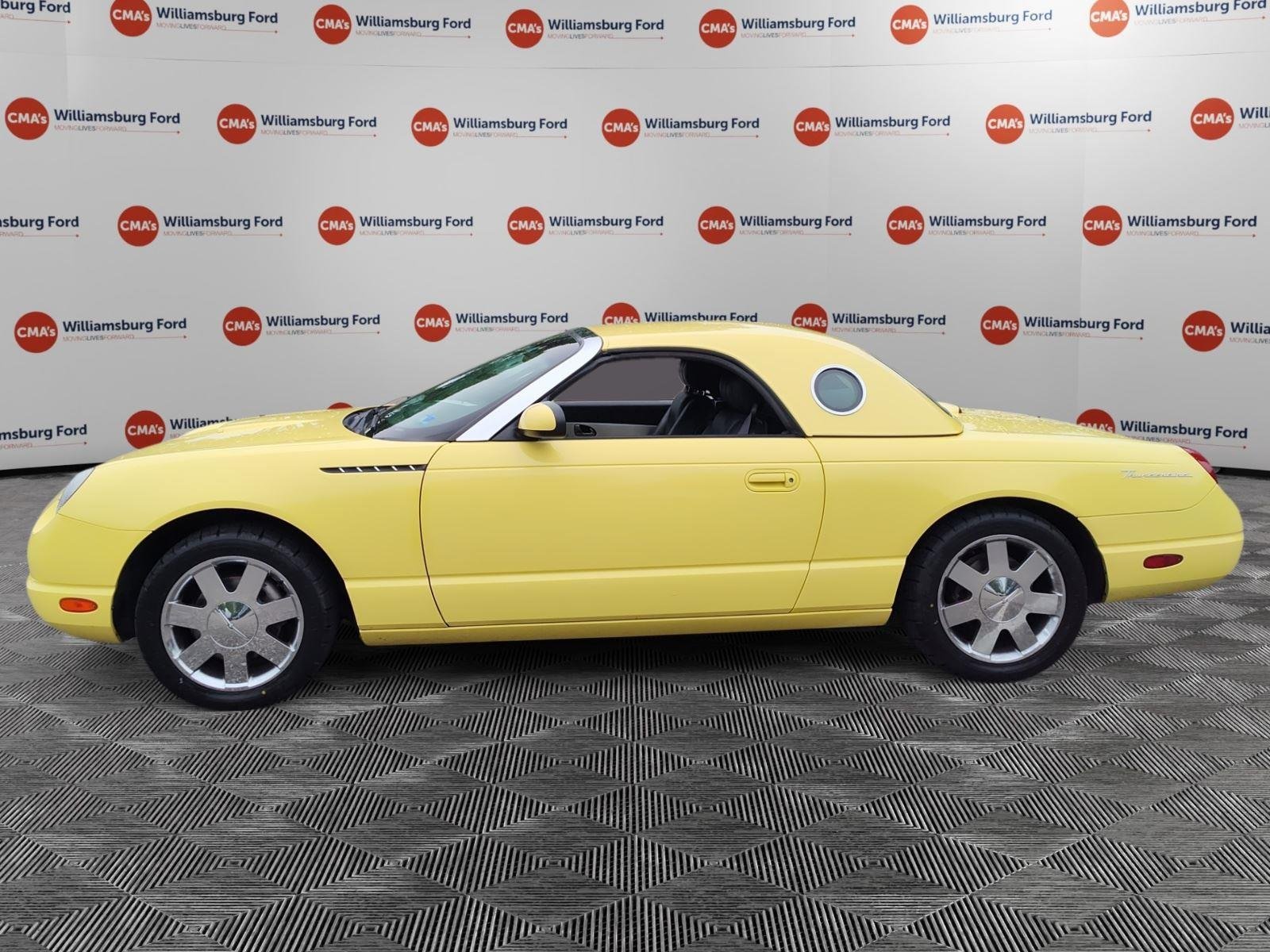 Used 2002 Inspiration Yellow Ford Deluxe image 2