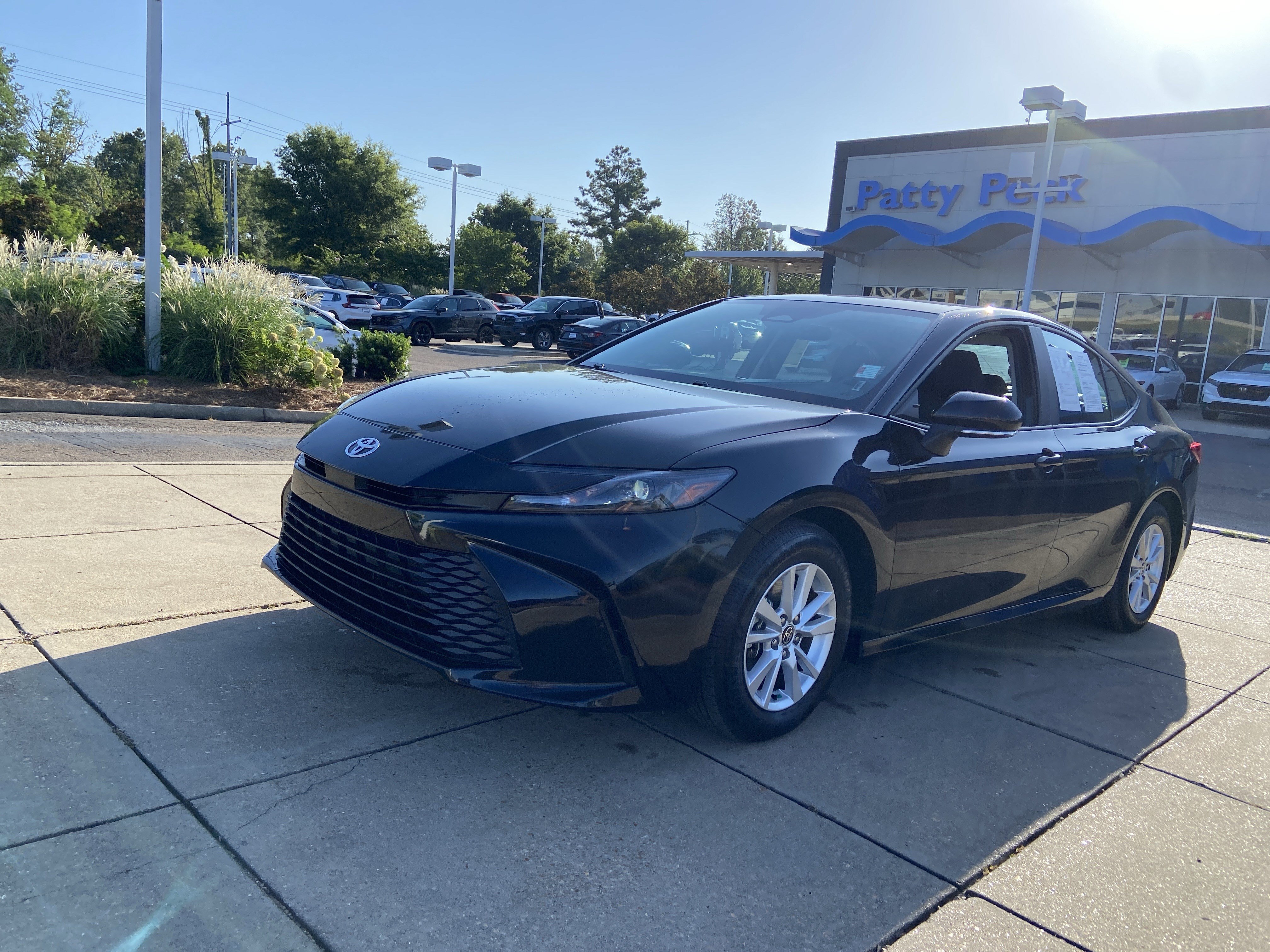 Used 2025 Midnight Black Metallic Toyota LE image 4