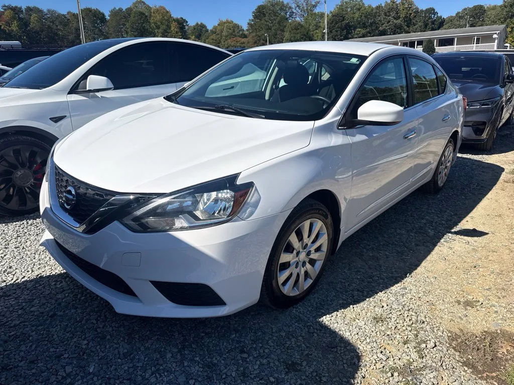 Used 2018 White Nissan S image 1