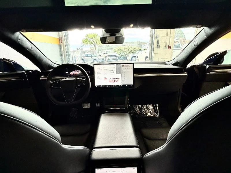Used 2022 Solid Black Tesla Plaid image 15
