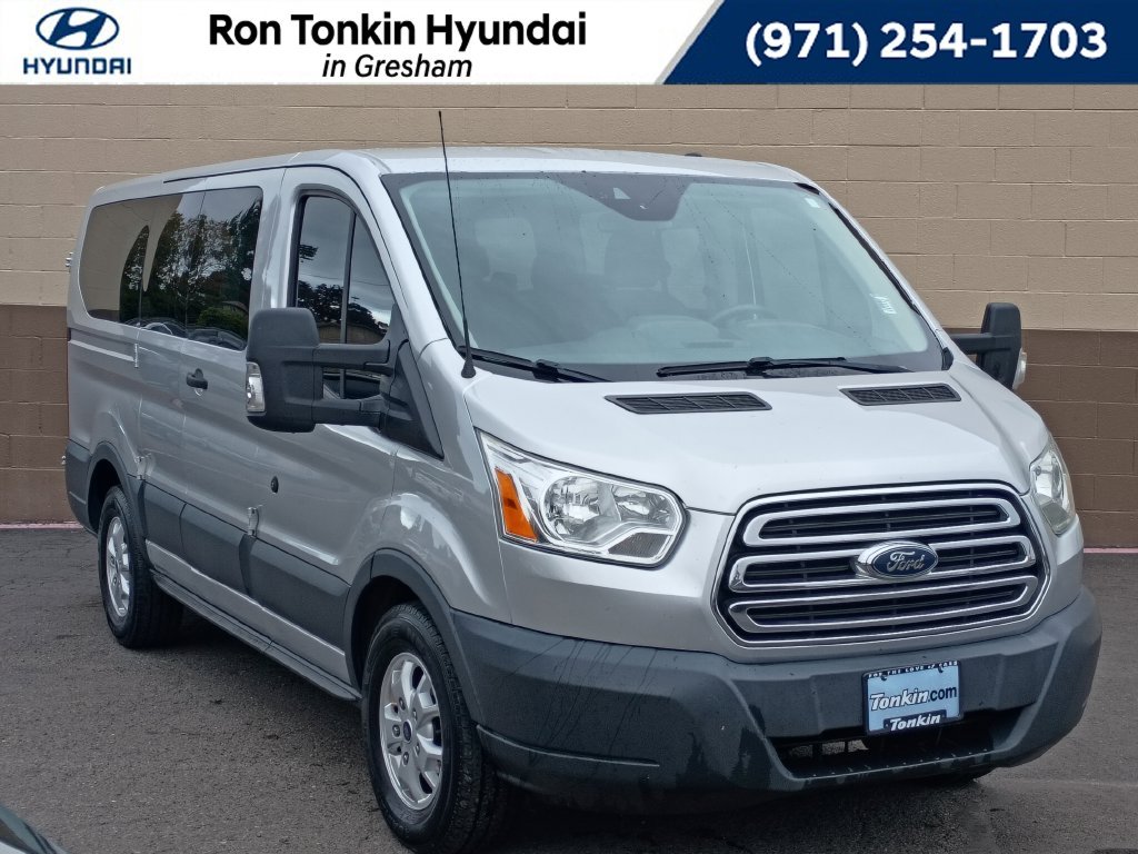 Used 2015 Ingot Silver Ford XLT image 1