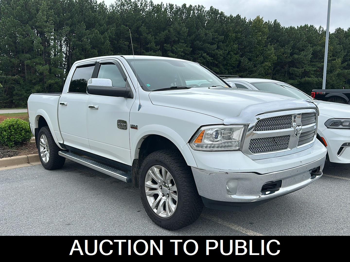 Used 2013 Bright White Ram Laramie Longhorn image 1