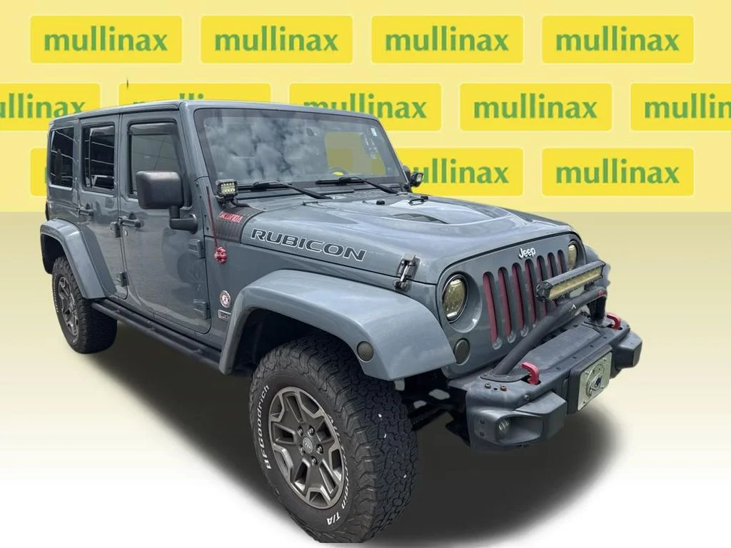 Used 2013 Gray Jeep Unlimited Rubicon image 1