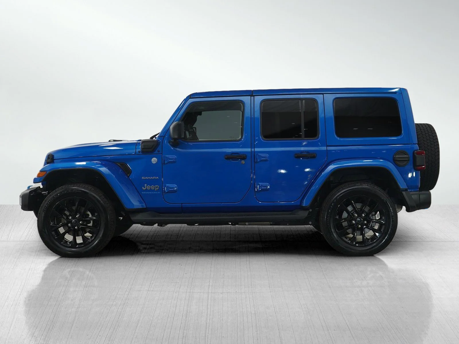 Used 2024 Jeep Wrangler 4xe Sahara 4XE with VIN 1C4RJXP63RW144580 for sale in Hopkins, Minnesota