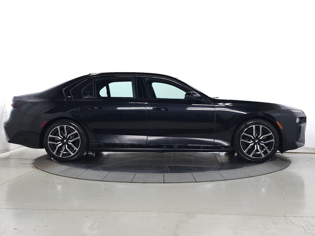 Used 2026 Black Sapphire Metallic BMW xDrive60 image 12