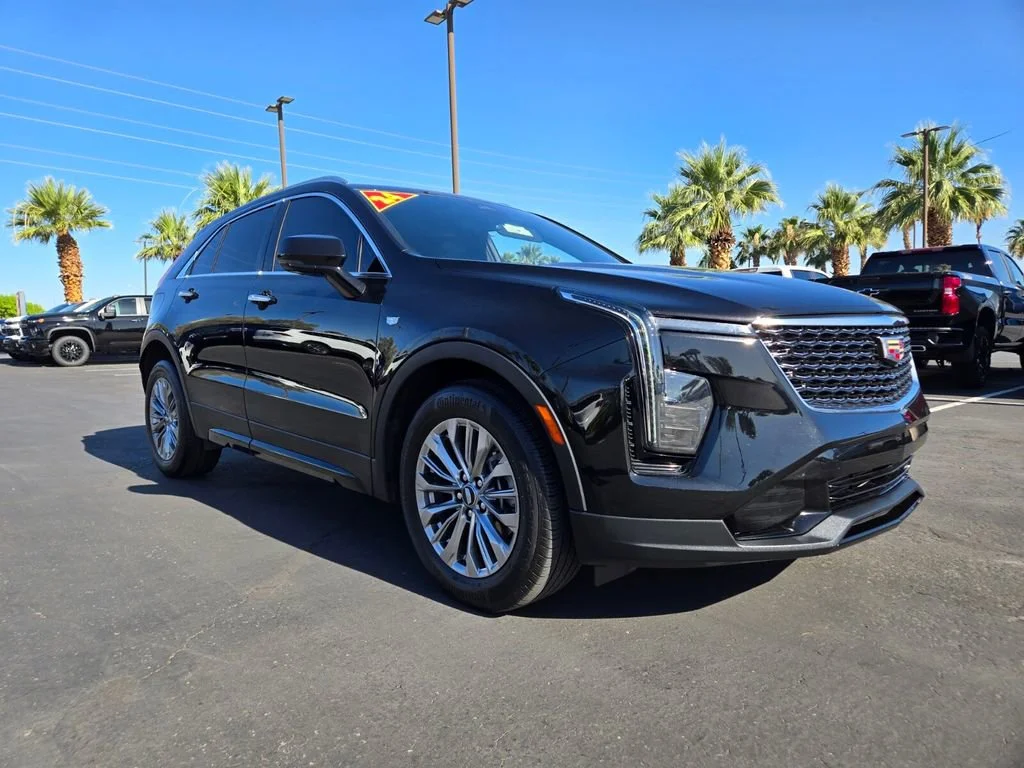 Used 2024 Stellar Black Metallic Cadillac Premium Luxury image 1