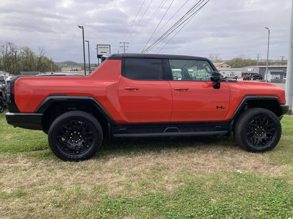 New 2026 Solar Orange GMC 2X image 2